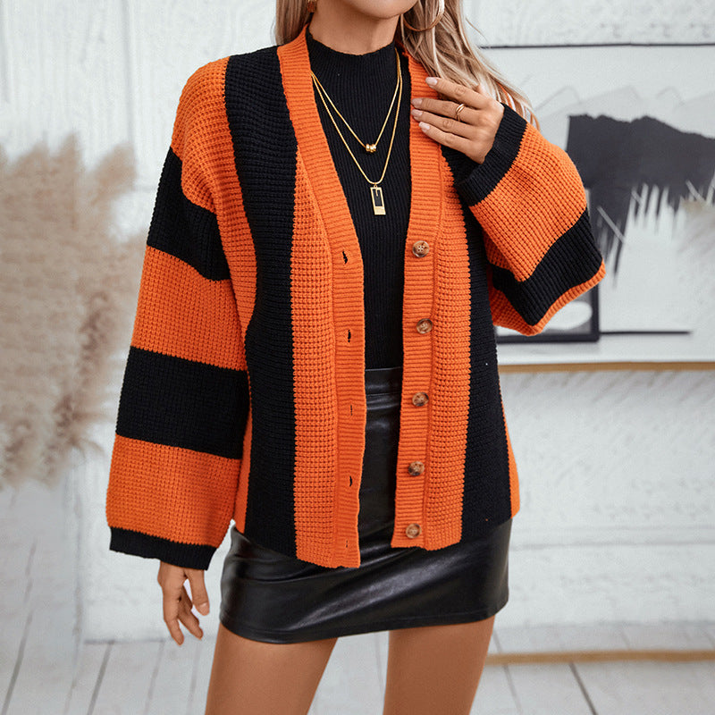 Gilet a maglia con righe a contrasto e ampie maniche a tromba