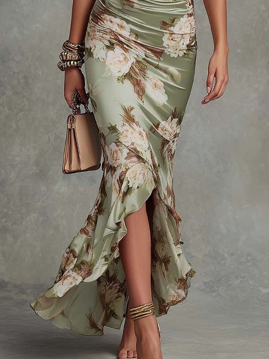 Anna - Abito lungo asimmetrico in satin verde con scollatura a V, maniche a sbuffo e motivo floreale