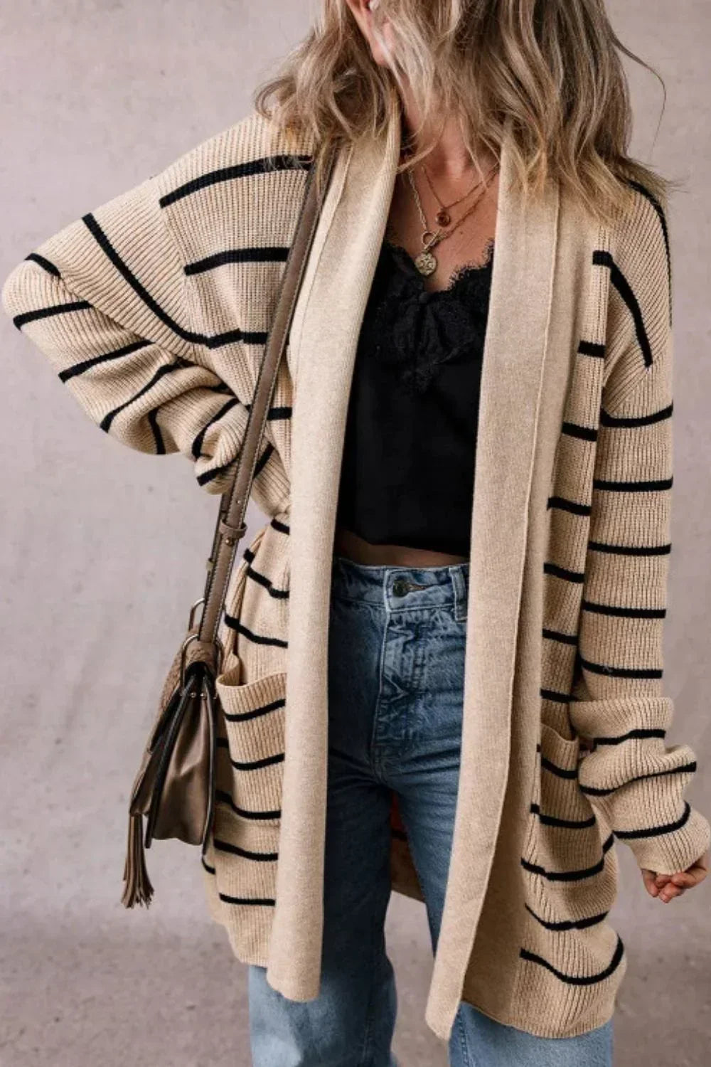 Cardigan aperto a righe con maniche lunghe