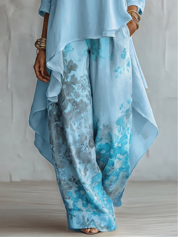 Set Top Asimmetrico Blu e Pantaloni Largo a Fiori