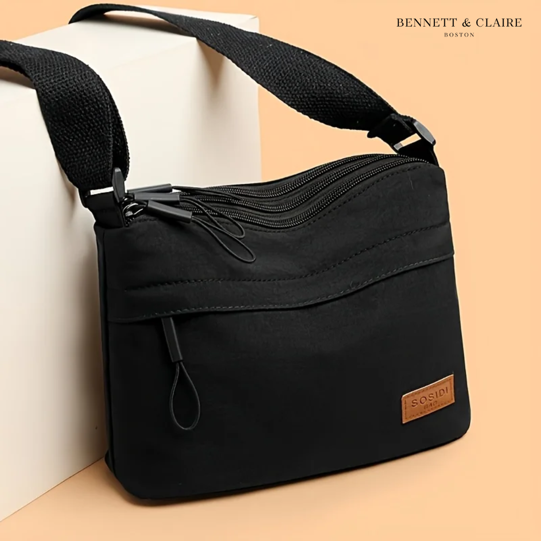 Borsa a Tracolla Multi-Pocket Carlyn™