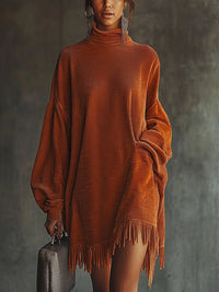 Abito arancione in corduroy con orlo a frange e colletto alto
