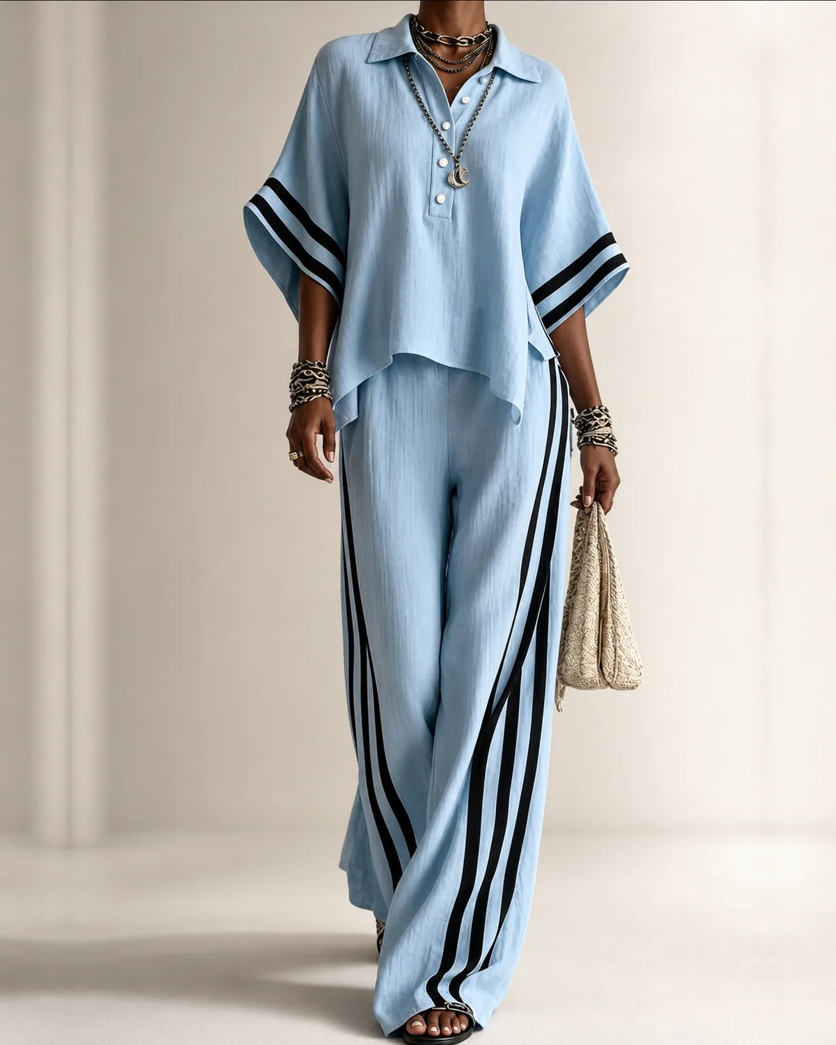 Naima | Top con Collo Polo e Set Pantaloni Larghi a Strisce Laterali